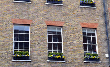 three windows of a typical british house, londonの写真素材