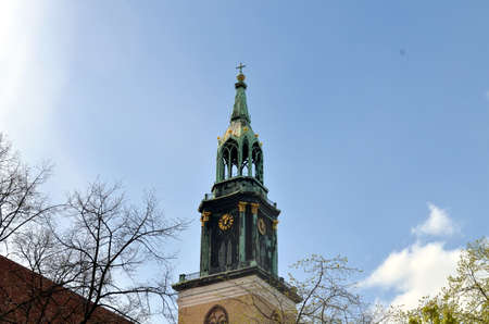 old church of st mary in berlin city with blue skyの写真素材