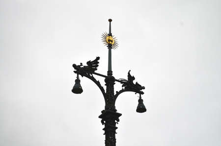 old lantern at the street in berlin with blue skyの写真素材