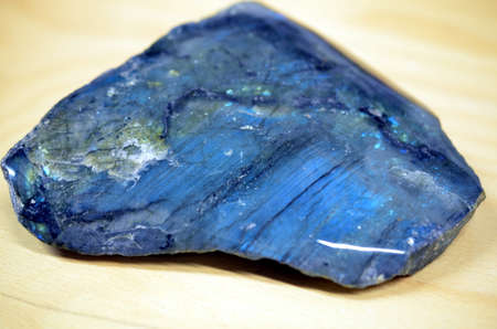 Close-up polished blue labradorite crystal texture, macro shot