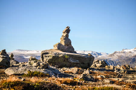 pile of rocks in sunny autumn landscapeの写真素材