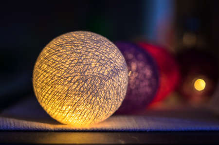 holiday light balls decoration in a rowの写真素材