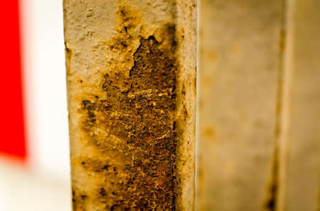 rusty brown and white closeup of handrail in cityの写真素材