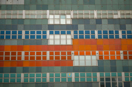 tiles and squares of a facade with repitition color patternの写真素材