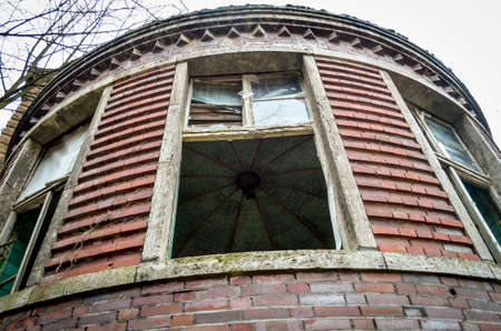 A broken window on a lost place factory