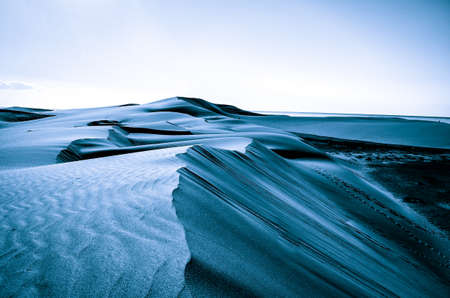 lost dune landscape in blue tonesの写真素材