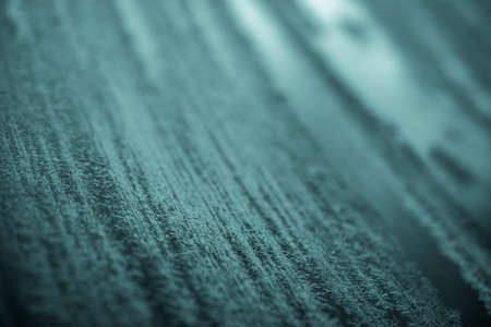 ice crystals growing in winter on glassの写真素材