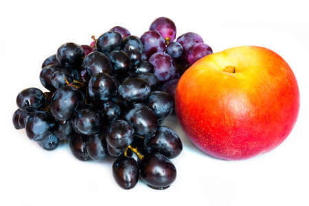 The picture shows grapes and peachesの写真素材