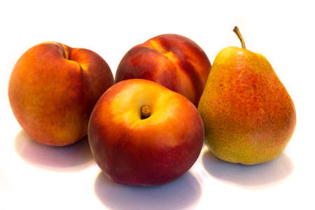 The picture shows a pear and peachの写真素材