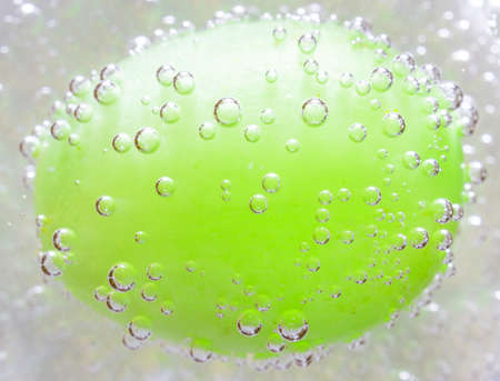 The photo depicts the grapes in the bubblesの写真素材