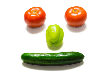 The photo shows vegetables on a white backgroundの写真素材