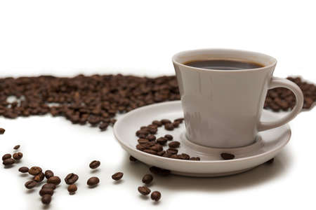 The photo shows a cup of coffee on a white backgroundの写真素材