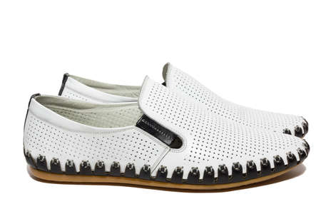 The photo shows the shoes on a white backgroundの写真素材