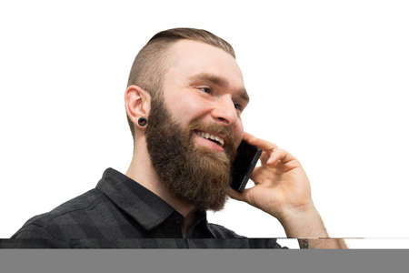 The photo depicts a bearded man on a white backgroundの写真素材