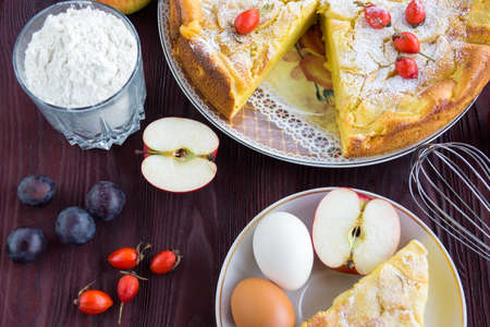 The photograph depicts an apple pie with berriesの写真素材