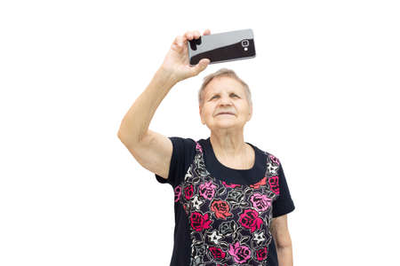 The photograph shows a woman with a phone in his handの写真素材