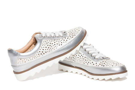 The photo shows the shoes on a white backgroundの写真素材