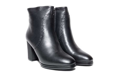 Female winter leather shoes on a white background, isolated, studioの写真素材