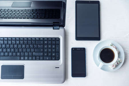 Laptop with tablet and smartphone on white backgroundの写真素材