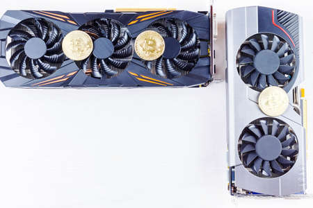Video card and bitcoin on a white background