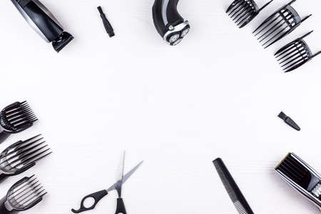 The machine for a hairstyle, the razor and scissors, the equipment for a hairdressing salonの写真素材