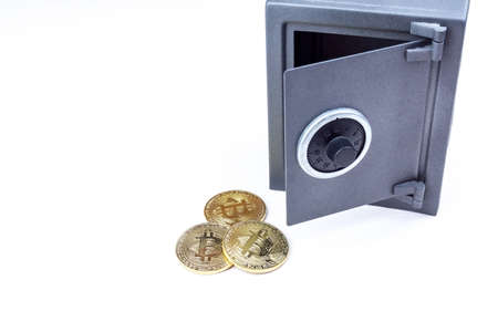 safe and bitcoin on a white backgroundの写真素材