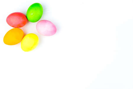 Multicolored easter eggs on a white backgroundの写真素材