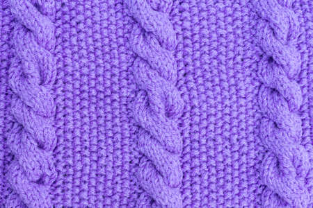 Texture of knitted woolen fabric for wallpaper and an abstract backgroundの写真素材