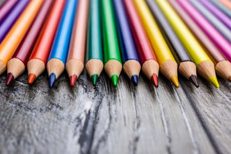 Colored pencils on a gray background, macroの写真素材