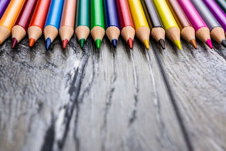Colored pencils on a gray background, macroの写真素材