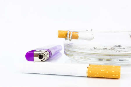 cigarette ashtray lighter and cigarette butt on white backgroundの写真素材