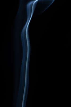 Smoke on black background close up, cigarette smoke on black backgroundの写真素材