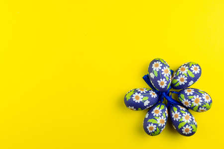 Easter, Easter egg color vibrant, spring Orthodox holiday. colorful decorated eggs in a basket on a...