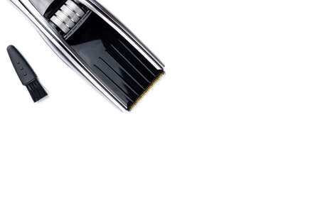 machine for haircuts. On the table are scissors and a comb. Barbershop. Hair clipper are on the...