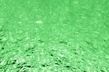 Abstract background white soapy foam texture. Shampoo foam with bubbles