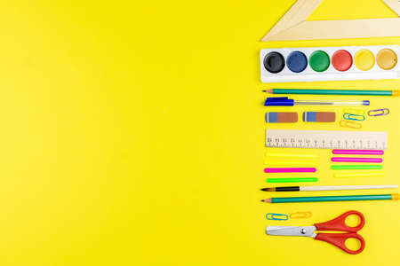 Back to school. School accessories on a yellow background.の写真素材