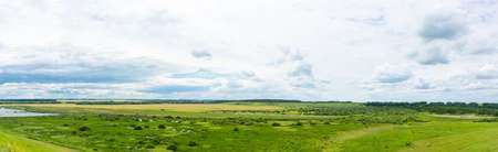 The expanses of Russia. Beautiful landscape of hills and Russian village.の写真素材