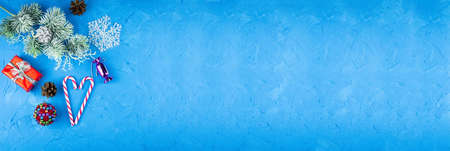 New Year and Christmas toys on a blue background