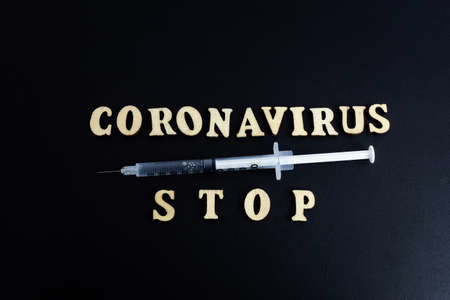 vaccine concept and background. Close up view of the vaccine bottles syringe.の写真素材