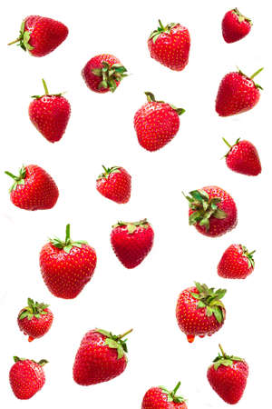 Falling strawberry isolated on white background, selective focus