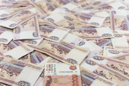 500 russian rubles bills lies in a big pile. Rich life conceptual background. Big amount of money