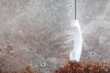 White phone handset with soft shadow on white