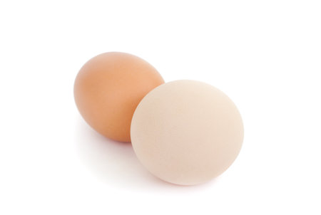 two chicken eggs isolated on white backgroundの写真素材