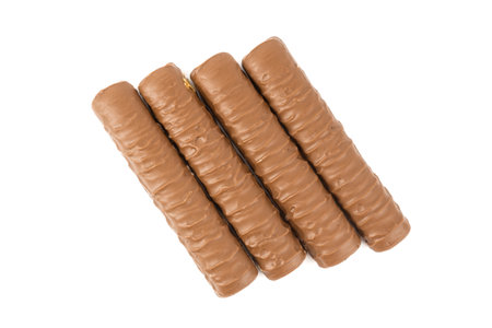 chocolate bar with caramel on white backgroundの写真素材