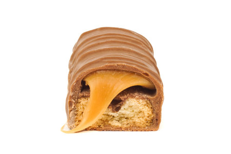 chocolate bar with caramel on white backgroundの写真素材