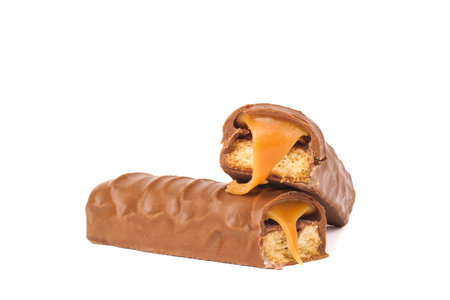 chocolate bar with caramel on white backgroundの写真素材
