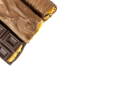 chocolate bar with caramel on white backgroundの写真素材