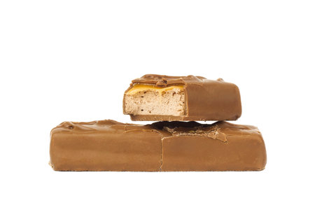 chocolate bar with caramel on white backgroundの写真素材