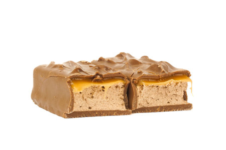 chocolate bar with caramel on white backgroundの写真素材