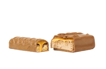 chocolate bar with caramel on white backgroundの写真素材